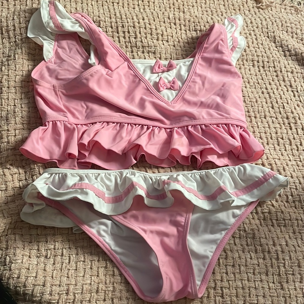 Slightly used little for big bathing suit